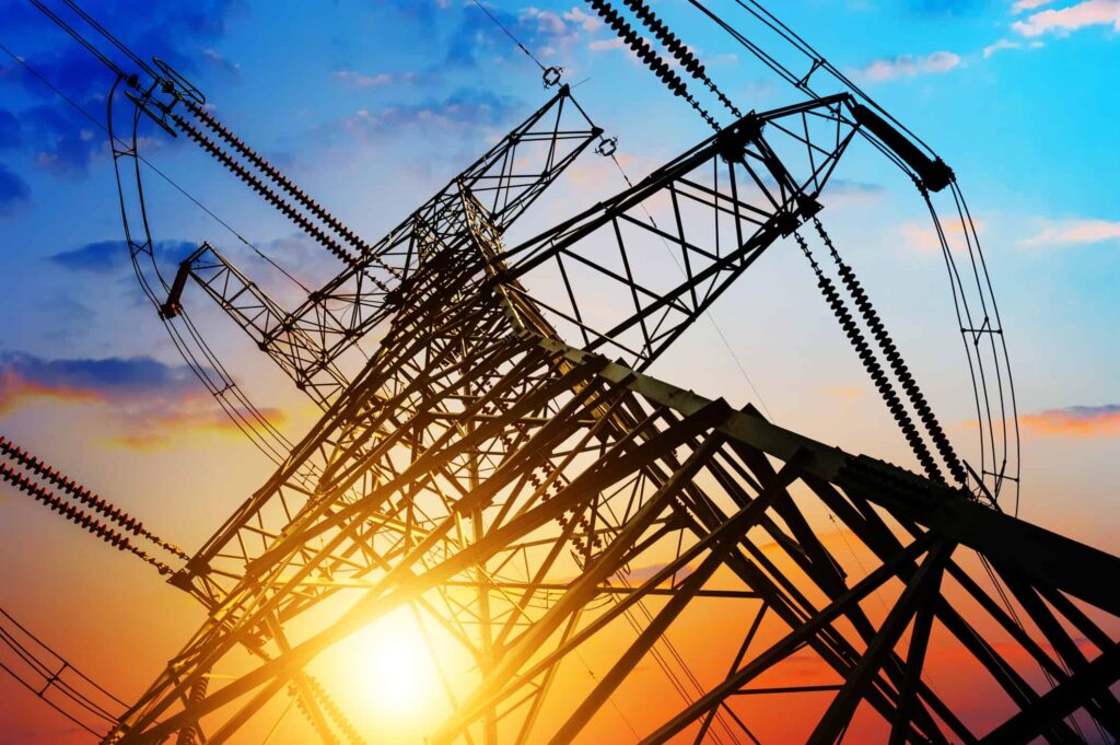 Power Hungry? 1 Utility Stock That Looks Like a Steal After Dipping 24% The sun sets behind a power source